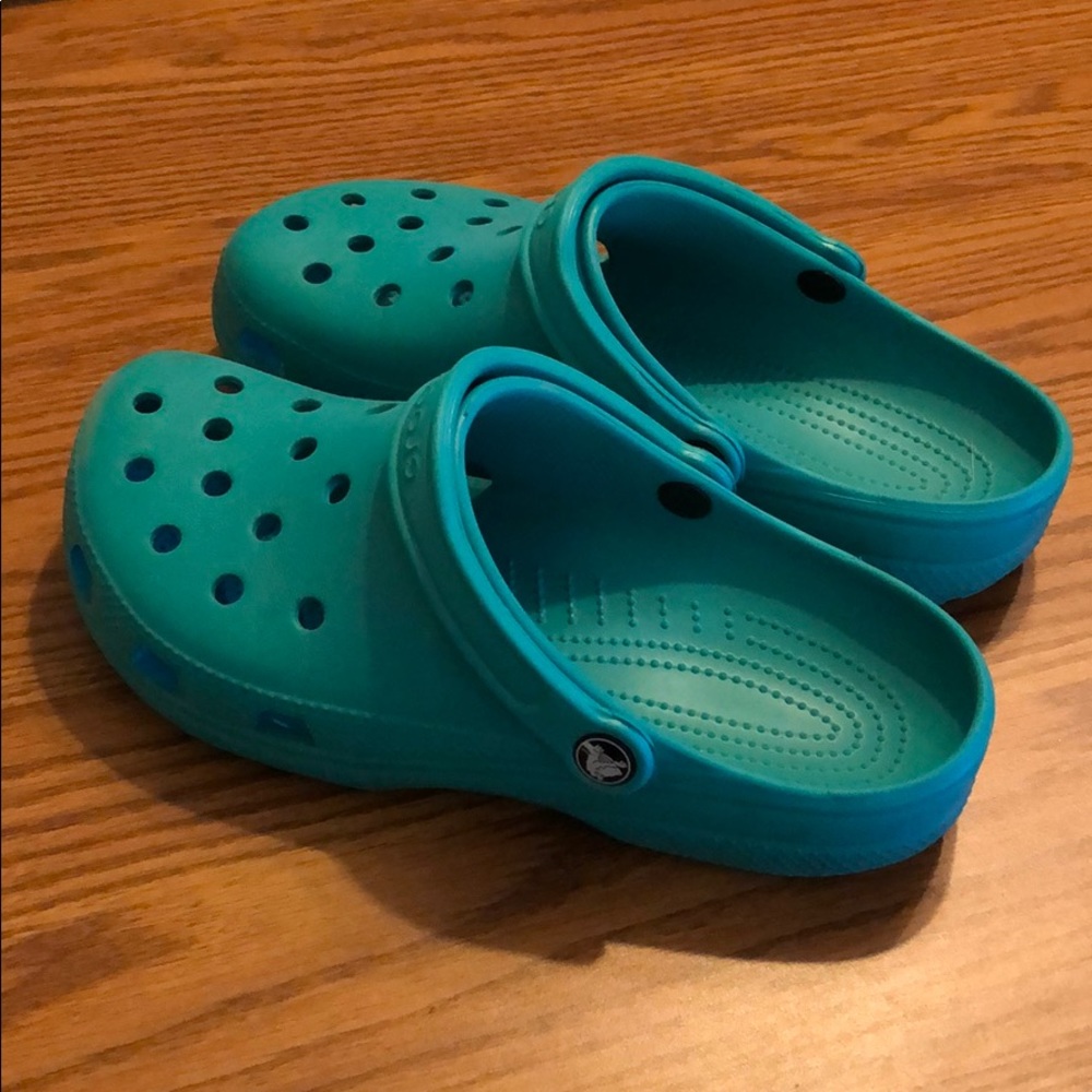 Women’s Teal Crocs Size  M8/W10